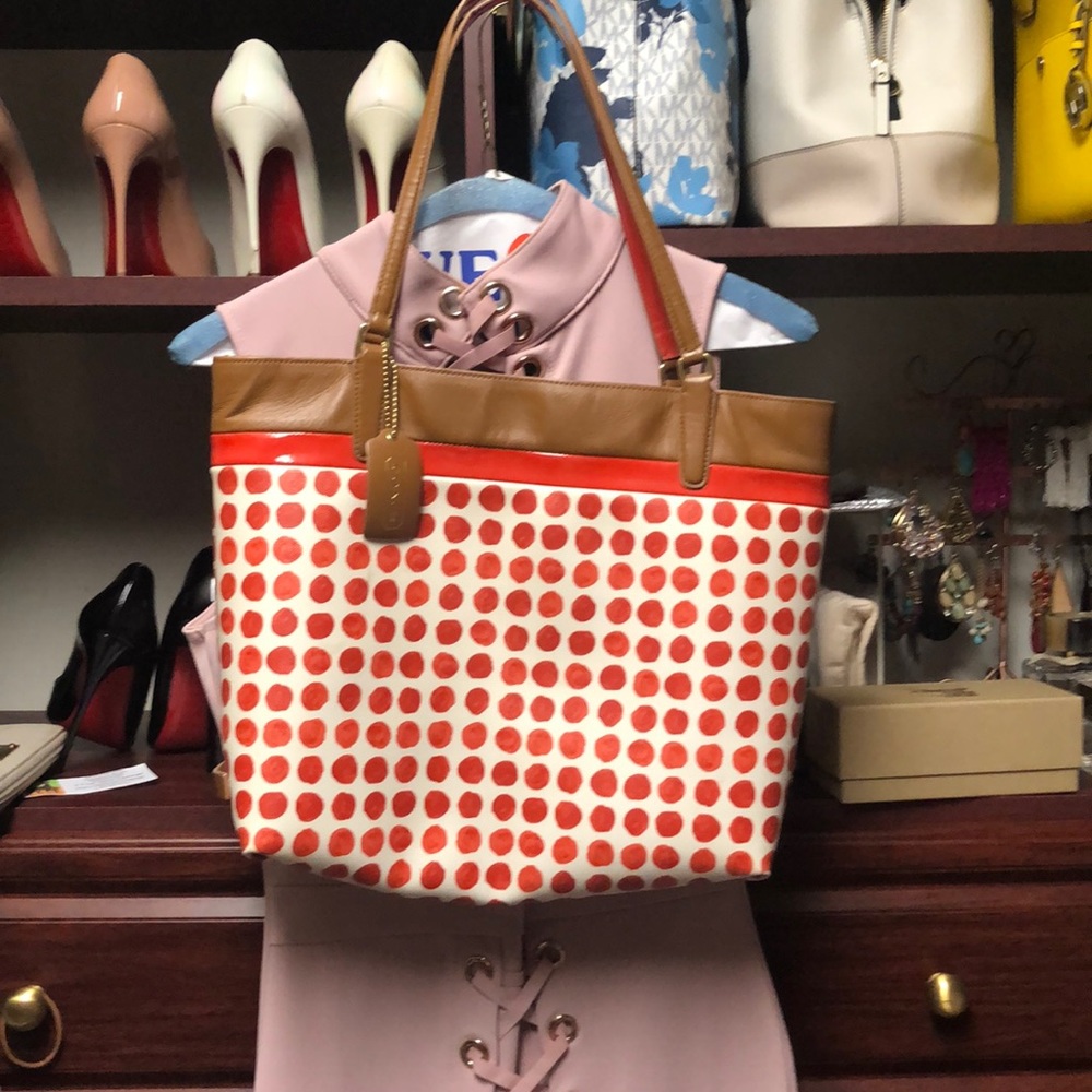 Orange and white coach bag